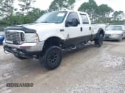 ✅ 2003 Ford F-350 XL • VIN: 1FTSW31P23ED37930 • Lot: 42341869. Listed on IAAI with 313,413 mi. Free auction sales archive from the USA and detailed vehicle history report at DreamBid. Image 2.