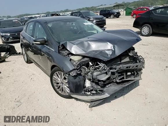 ✅ 2015 Ford Focus Titanium • VIN: 1FADP3N23FL274959 • Lot: 71277115. Wystawiony na Copart z przebiegiem 179 632 mil. Bezpłatny archiwum sprzedaży aukcyjnych z USA i szczegółowy raport historii pojazdu na DreamBid. Zdjęcie 14.