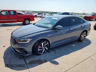 ✅ 2021 Volkswagen Jetta S • VIN: 3VW6T7BU0MM088719 • Lot: 80496285. Listed on Copart with 24,079 mi. Free auction sales archive from the USA and detailed vehicle history report at DreamBid. Image 1.