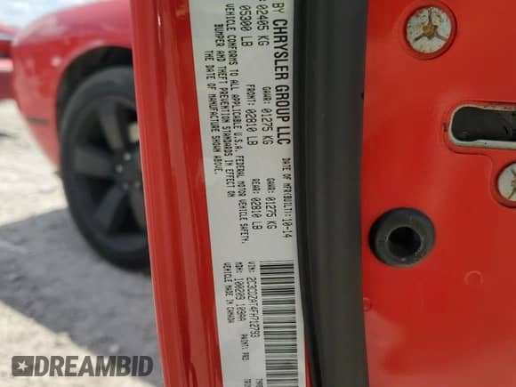 2015 Dodge Challenger R/T z VIN 2C3CDZAT4FH712793, wystawiony jako Copart lot #69822155 z przebiegiem Nie podano mil oraz Szkoda całkowita • Salvage title. Historia ofert i sprzedaży dostępna na DreamBid. Obrazek 12.