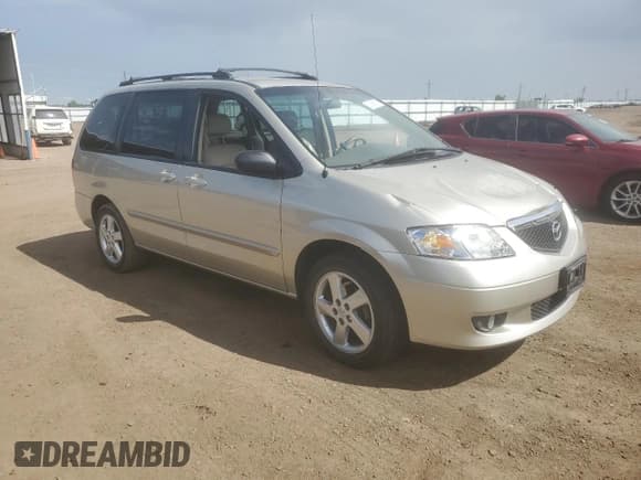 ✅ 2002 Mazda MPV LX • VIN: JM3LW28J620303427 • Лот: 59295635. Опубликован ранее на Copart с пробегом 112 001 миль. Бесплатный доступ к архиву аукционных продаж из США и подробный отчёт об истории автомобиля на DreamBid. Изображение 4.