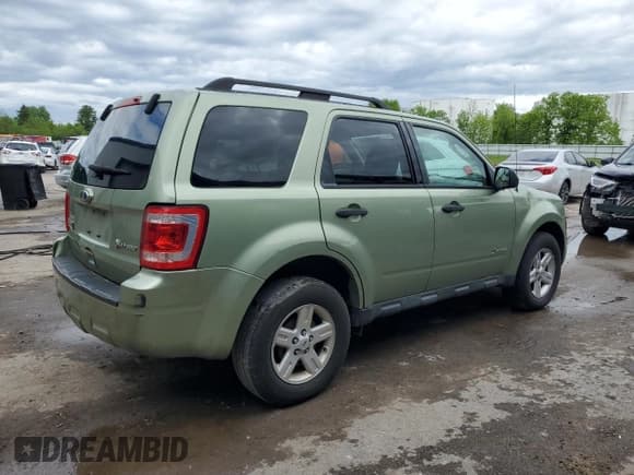 ✅ 2010 Ford Escape Hybrid • VIN: 1FMCU5K31AKA96034 • Lot: 58322125. Listed on Copart with 106,711 mi. Free auction sales archive from the USA and detailed vehicle history report at DreamBid. Image 3.