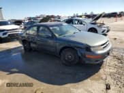 ✅ 1998 Nissan Maxima GXE • VIN: JN1CA21D0WT607873 • Lot: 80856484. Wystawiony na Copart z przebiegiem 198 057 mil. Bezpłatny archiwum sprzedaży aukcyjnych z USA i szczegółowy raport historii pojazdu na DreamBid. Zdjęcie 4.