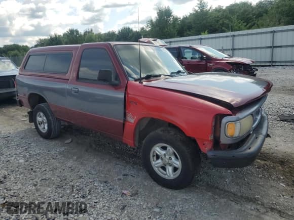 ✅ 1995 Mazda B-Series • VIN: 4F4CR12A3STM32220 • Lot: 61258765. Listed on Copart with 162,629 mi. Free auction sales archive from the USA and detailed vehicle history report at DreamBid. Image 4.