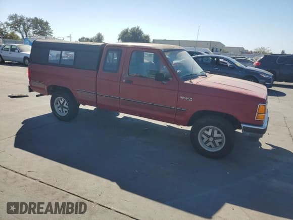 ✅ 1990 Ford Ranger • VIN: 1FTCR15T6LPB70547 • Lot: 81755335. Listed on Copart with 24,338 mi. Free auction sales archive from the USA and detailed vehicle history report at DreamBid. Image 4.