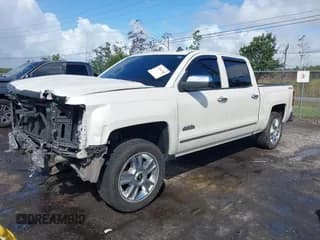✅ 2014 Chevrolet Silverado 1500 High Country • VIN: 3GCUKTEJ2EG318221 • Lot: 43350768. Wystawiony na IAAI z przebiegiem 209 321 mil. Bezpłatny archiwum sprzedaży aukcyjnych z USA i szczegółowy raport historii pojazdu na DreamBid. Zdjęcie 2.