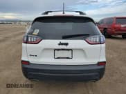 ✅ 2020 Jeep Cherokee Altitude • VIN: 1C4PJMLXXLD506072 • Lot: 82436645. Wystawiony na Copart z przebiegiem 38 970 mil. Bezpłatny archiwum sprzedaży aukcyjnych z USA i szczegółowy raport historii pojazdu na DreamBid. Zdjęcie 6.