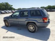 ✅ 2002 Jeep Grand Cherokee Laredo • VIN: 1J4GW48N72C252067 • Lot: 57414455. Listed on Copart with 133,429 mi. Free auction sales archive from the USA and detailed vehicle history report at DreamBid. Image 2.