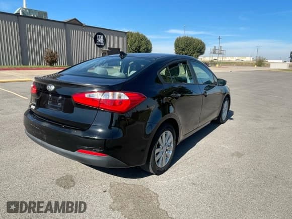 ✅ 2014 Kia Forte LX • VIN: KNAFX4A62E5249083 • Lot: 92046415. Listed on Copart with 98,097 mi. Free auction sales archive from the USA and detailed vehicle history report at DreamBid. Image 4.