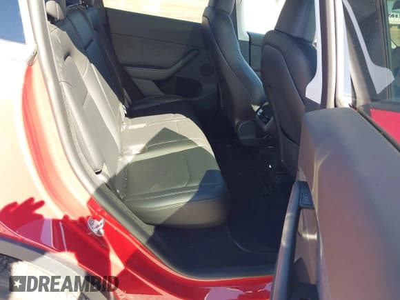 ✅ 2023 Tesla Model Y Long Range • VIN: 7SAYGDEE7PA102918 • Lot: 43596038. Listed on IAAI with 13,681 mi. Free auction sales archive from the USA and detailed vehicle history report at DreamBid. Image 8.