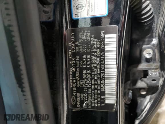 2005 Hyundai Tucson GLS z VIN KM8JN72D15U047175, wystawiony jako Copart lot #83090704 z przebiegiem 97 247 mil mil oraz Szkoda całkowita • Salvage title. Historia ofert i sprzedaży dostępna na DreamBid. Obrazek 14.
