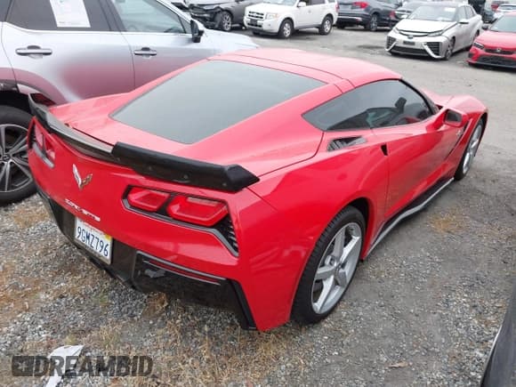 ✅ 2015 Chevrolet Corvette 1LT • VIN: 1G1YA2D77F5122992 • Lot: 42386670. Listed on IAAI with 59,722 mi. Free auction sales archive from the USA and detailed vehicle history report at DreamBid. Image 4.