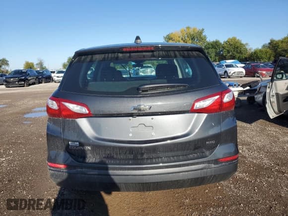 ✅ 2018 Chevrolet Equinox LS • VIN: 2GNAXREV4J6197117 • Lot: 85364585. Wystawiony na Copart z przebiegiem 61 838 mil. Bezpłatny archiwum sprzedaży aukcyjnych z USA i szczegółowy raport historii pojazdu na DreamBid. Zdjęcie 6.