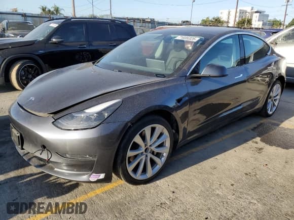 ✅ 2019 Tesla Model 3 Mid Range • VIN: 5YJ3E1EA9KF425341 • Лот: 91252195. Опубликован ранее на Copart с пробегом 83 869 миль. Бесплатный доступ к архиву аукционных продаж из США и подробный отчёт об истории автомобиля на DreamBid. Изображение 1.