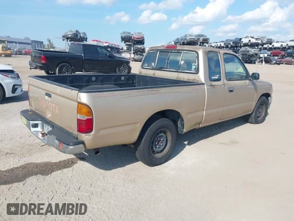 ✅ 1996 Toyota Tacoma • VIN: 4TAVL52N0TZ150639 • Lot: 43787472. Listed on IAAI with 191,301 mi. Free auction sales archive from the USA and detailed vehicle history report at DreamBid. Image 4.