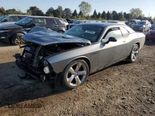 ✅ 2012 Dodge Challenger SXT • VIN: 2C3CDYAG4CH275676 • Lot: 74502834. Wystawiony na Copart z przebiegiem 99 500 mil. Bezpłatny archiwum sprzedaży aukcyjnych z USA i szczegółowy raport historii pojazdu na DreamBid. Zdjęcie 1.