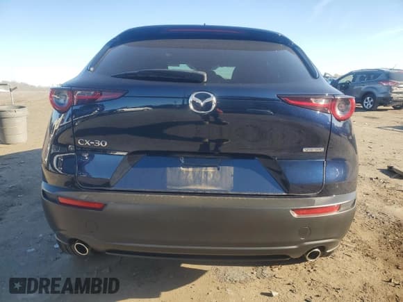 ✅ 2021 Mazda CX-30 Premium • VIN: 3MVDMADM1MM225666 • Лот: 92259715. Опубликован ранее на Copart с пробегом 41 514 миль. Бесплатный доступ к архиву аукционных продаж из США и подробный отчёт об истории автомобиля на DreamBid. Изображение 6.
