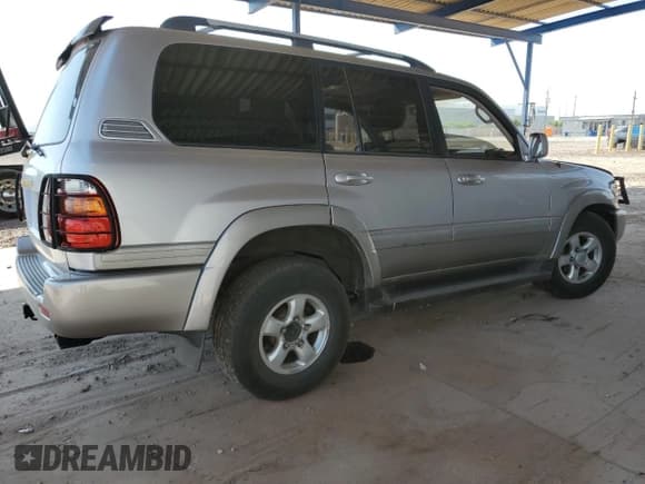✅ 1999 Toyota Land Cruiser • VIN: JT3HT05J1X0028643 • Lot: 68390045. Listed on Copart with 424,148 mi. Free auction sales archive from the USA and detailed vehicle history report at DreamBid. Image 3.