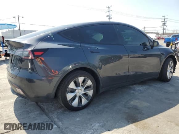 ✅ 2024 Tesla Model Y Long Range • VIN: 7SAYGDEE0RF024326 • Lot: 52149675. Listed on Copart with 34,503 mi. Free auction sales archive from the USA and detailed vehicle history report at DreamBid. Image 3.