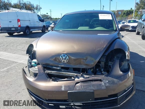 ✅ 2014 Volkswagen Beetle 2.0L TDI w/Sun/Sound/Nav • VIN: 3VWJL7AT1EM617082 • Лот: 43442124. Опубликован ранее на IAAI с пробегом 110 037 миль. Бесплатный доступ к архиву аукционных продаж из США и подробный отчёт об истории автомобиля на DreamBid. Изображение 13.