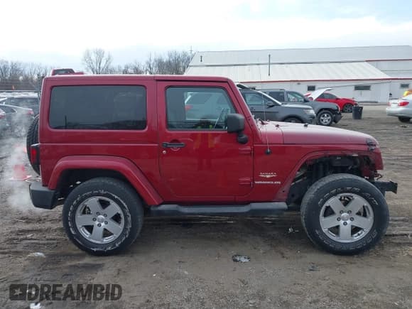 ✅ 2012 Jeep Wrangler Sahara • VIN: 1C4GJWBG0CL216622 • Lot: 41536639. Wystawiony na IAAI z przebiegiem 67 839 mil. Bezpłatny archiwum sprzedaży aukcyjnych z USA i szczegółowy raport historii pojazdu na DreamBid. Zdjęcie 14.