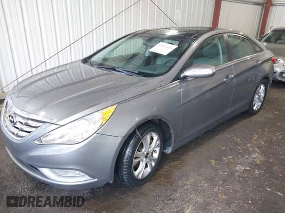 2013 Hyundai Sonata SE with VIN 5NPEC4ACXDH678597, listed as a IAAI auction lot 42026426 with 94,671 mi miles and . Bid and sale history available at DreamBid. Image 2.
