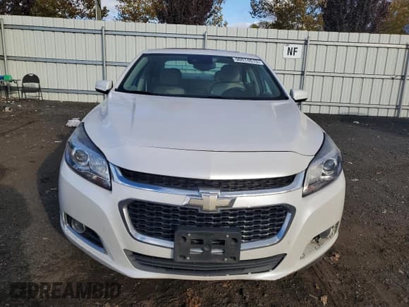 ✅ 2015 Chevrolet Malibu LTZ • VIN: 1G11G5SXXFF320528 • Lot: 90014615. Listed on Copart with 95,165 mi. Free auction sales archive from the USA and detailed vehicle history report at DreamBid. Image 5.