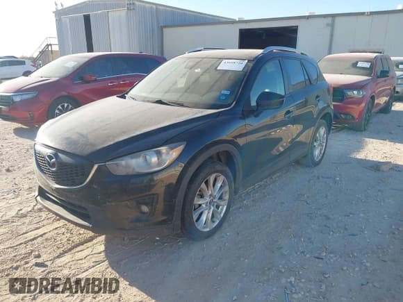 ✅ 2014 Mazda CX-5 Grand Touring • VIN: JM3KE2DY7E0345255 • Lot: 43668720. Listed on IAAI with 270,412 mi. Free auction sales archive from the USA and detailed vehicle history report at DreamBid. Image 2.