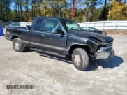 ✅ 1997 Chevrolet Silverado 1500 • VIN: 2GCEK19R6V1217877 • Lot: 90661175. Listed on Copart with 140,744 mi. Free auction sales archive from the USA and detailed vehicle history report at DreamBid. Image 4.