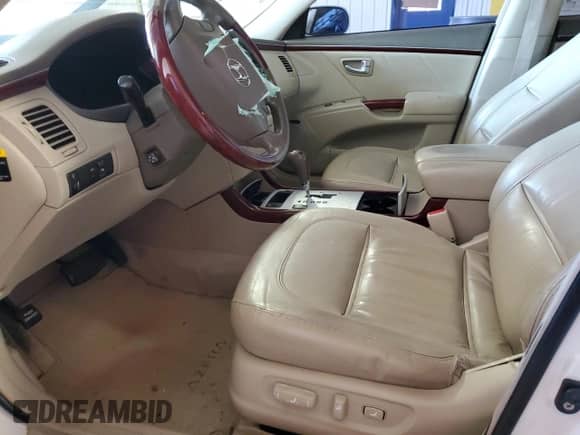 2006 Hyundai Azera SE с VIN KMHFC46F96A136033, выставлен на аукционе Copart как лот 53430715 с пробегом Не указан миль и Списание • Salvage title. История ставок и продаж доступна на DreamBid. Изображение 7.