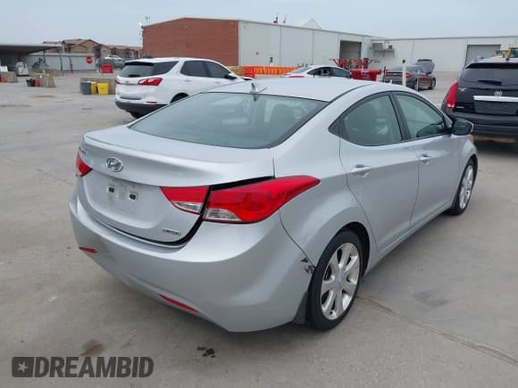 ✅ 2013 Hyundai Elantra GLS • VIN: 5NPDH4AE7DH268063 • Lot: 42269526. Listed on IAAI with 123,067 mi. Free auction sales archive from the USA and detailed vehicle history report at DreamBid. Image 4.