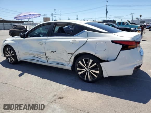 ✅ 2019 Nissan Altima SR • VIN: 1N4BL4CVXKC208294 • Лот: 71694275. Опубликован ранее на Copart с пробегом 103 532 миль. Бесплатный доступ к архиву аукционных продаж из США и подробный отчёт об истории автомобиля на DreamBid. Изображение 2.