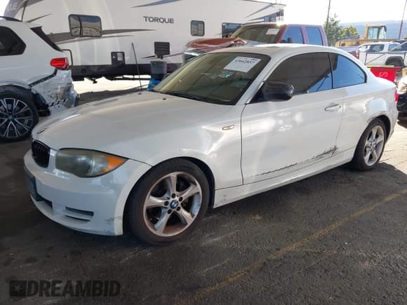 ✅ 2011 BMW 1 Series 128i • VIN: WBAUP9C56BVL90386 • Lot: 43662857. Listed on IAAI with 136,956 mi. Free auction sales archive from the USA and detailed vehicle history report at DreamBid. Image 17.