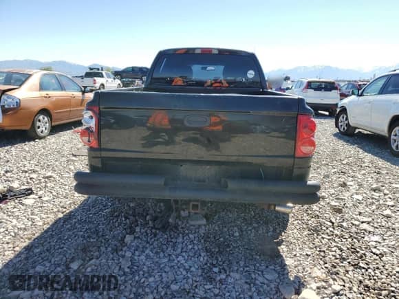 2005 Dodge Dakota ST with VIN 1D7HW28K55S259104, listed as a Copart auction lot 55859185 with 143,004 mi miles and Salvage title. Bid and sale history available at DreamBid. Image 6.