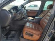 ✅ 2004 Volkswagen Touareg • VIN: WVGCM77L34D073254 • Lot: 69569165. Listed on Copart with 182,379 mi. Free auction sales archive from the USA and detailed vehicle history report at DreamBid. Image 7.