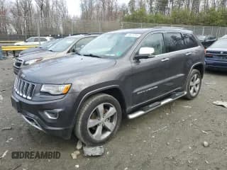✅ 2015 Jeep Grand Cherokee Overland • VIN: 1C4RJFCG0FC848046 • Лот: 49514795. Опубликован ранее на Copart с пробегом 212 688 миль. Бесплатный доступ к архиву аукционных продаж из США и подробный отчёт об истории автомобиля на DreamBid. Изображение 1.