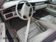 ✅ 1995 Cadillac Concours • VIN: 1G6KF52Y3SU270555 • Лот: 76318254. Опубликован ранее на Copart с пробегом Не указан. Бесплатный доступ к архиву аукционных продаж из США и подробный отчёт об истории автомобиля на DreamBid. Изображение 8.