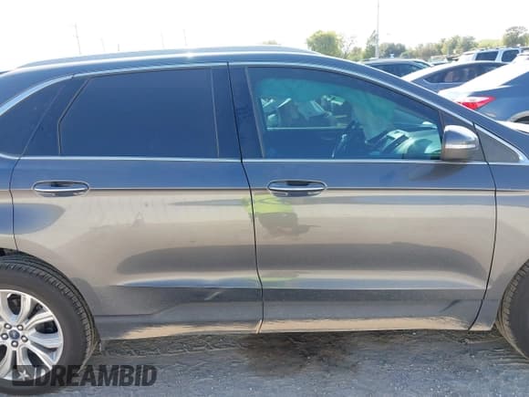✅ 2020 Ford Edge Titanium • VIN: 2FMPK3K9XLBA98670 • Lot: 43331908. Wystawiony na IAAI z przebiegiem 71 106 mil. Bezpłatny archiwum sprzedaży aukcyjnych z USA i szczegółowy raport historii pojazdu na DreamBid. Zdjęcie 13.