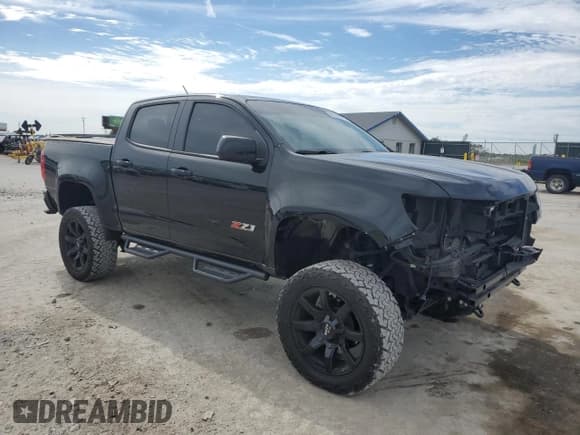 ✅ 2021 Chevrolet Colorado 4WD Z71 • VIN: 1GCGTDENXM1298123 • Lot: 86788515. Listed on Copart with 27,720 mi. Free auction sales archive from the USA and detailed vehicle history report at DreamBid. Image 4.