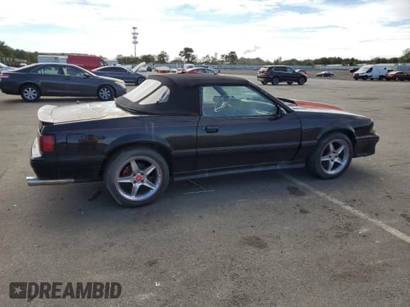 ✅ 1987 Ford Mustang • VIN: 1FABP40E4HF227990 • Lot: 73324394. Listed on Copart with 105,422 mi. Free auction sales archive from the USA and detailed vehicle history report at DreamBid. Image 3.