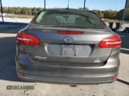 ✅ 2018 Ford Focus SE • VIN: 1FADP3FE4JL276933 • Lot: 90671225. Listed on Copart with 89,503 mi. Free auction sales archive from the USA and detailed vehicle history report at DreamBid. Image 6.