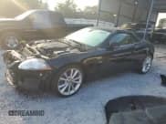 ✅ 2010 Jaguar XK XKR • VIN: SAJWA4ECXAMB35230 • Lot: 70893904. Listed on Copart with 23,209 mi. Free auction sales archive from the USA and detailed vehicle history report at DreamBid. Image 1.