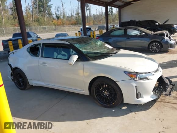 ✅ 2016 Scion tC • VIN: JTKJF5C7XGJ014834 • Лот: 43299080. Опубликован ранее на IAAI с пробегом 90 433 миль. Бесплатный доступ к архиву аукционных продаж из США и подробный отчёт об истории автомобиля на DreamBid. Изображение 13.