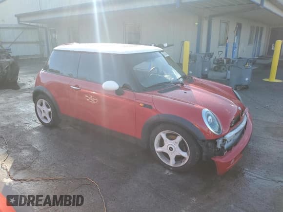✅ 2003 MINI Hardtop • VIN: WMWRC33413TJ51993 • Lot: 87202465. Listed on Copart with 105,250 mi. Free auction sales archive from the USA and detailed vehicle history report at DreamBid. Image 4.