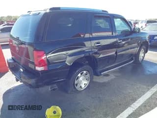 ✅ 2002 Cadillac Escalade • VIN: 1GYEK63NX2R225996 • Lot: 43477351. Wystawiony na IAAI z przebiegiem 303 874 mil. Bezpłatny archiwum sprzedaży aukcyjnych z USA i szczegółowy raport historii pojazdu na DreamBid. Zdjęcie 4.