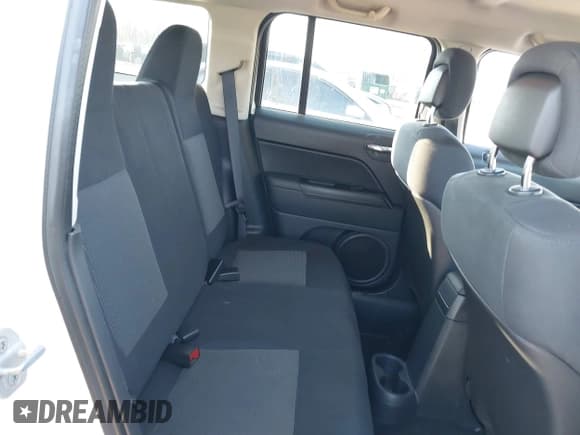 ✅ 2012 Jeep Patriot Latitude • VIN: 1C4NJRFB0CD630615 • Lot: 43732670. Listed on IAAI with 90,197 mi. Free auction sales archive from the USA and detailed vehicle history report at DreamBid. Image 8.
