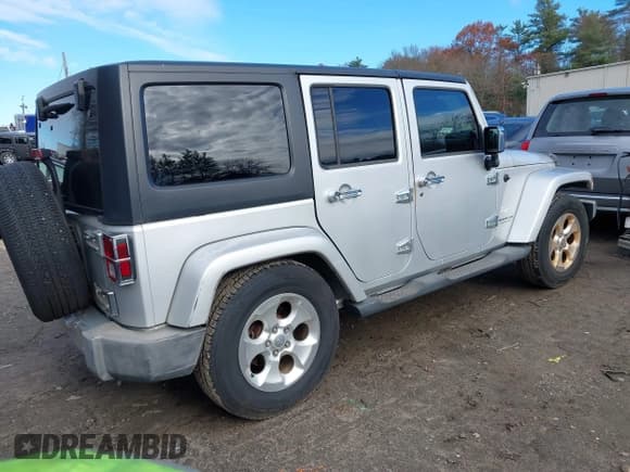 ✅ 2007 Jeep Wrangler Unlimited Sahara • VIN: 1J4GB59167L158122 • Лот: 40911727. Опубликован ранее на IAAI с пробегом 190 157 миль. Бесплатный доступ к архиву аукционных продаж из США и подробный отчёт об истории автомобиля на DreamBid. Изображение 4.