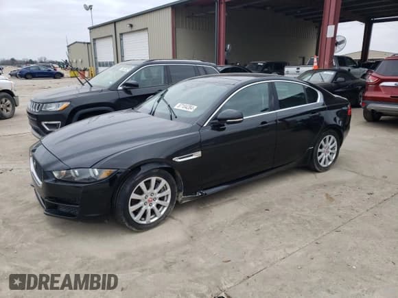 ✅ 2019 Jaguar XE 25t • VIN: SAJAS4FX1KCP49077 • Lot: 87104284. Listed on Copart with 124,857 mi. Free auction sales archive from the USA and detailed vehicle history report at DreamBid. Image 1.
