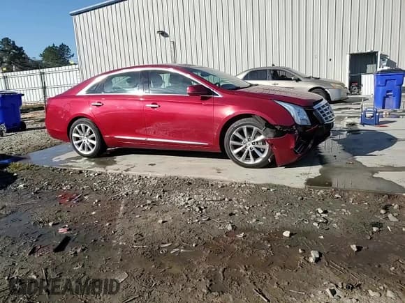 ✅ 2013 Cadillac XTS Luxury • VIN: 2G61R5S30D9166306 • Lot: 91582275. Listed on Copart with 129,484 mi. Free auction sales archive from the USA and detailed vehicle history report at DreamBid. Image 13.