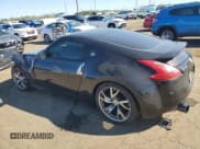 ✅ 2013 Nissan 370Z • VIN: JN1AZ4EHXDM381485 • Lot: 81935595. Wystawiony na Copart z przebiegiem 154 910 mil. Bezpłatny archiwum sprzedaży aukcyjnych z USA i szczegółowy raport historii pojazdu na DreamBid. Zdjęcie 2.